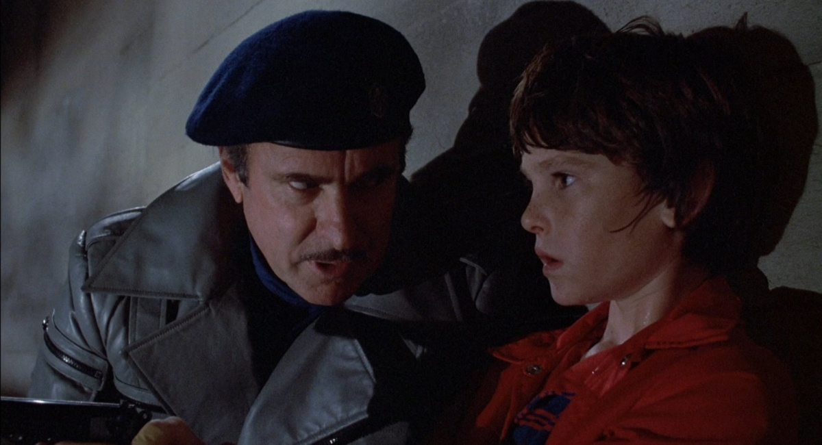 (L to R) Dabney Coleman and Henry Thomas in 1984's 'Cloak & Dagger'.