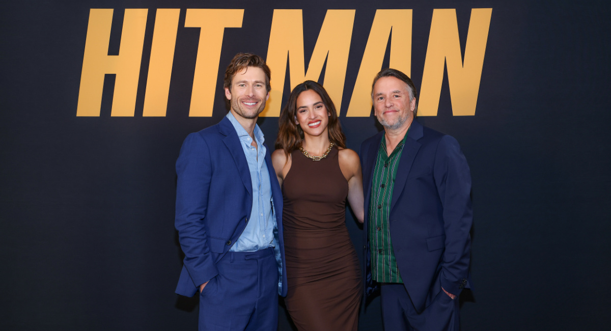 Glen Powell, Adria Arjona, director Richard Linklater and Sanjay Rao for 'Hit Man'.