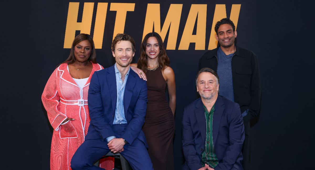 Retta, Glen Powell, Adria Arjona, director Richard Linklater and Sanjay Rao for 'Hit Man'.