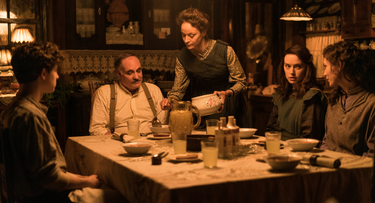 Kim Bodnia as Henry Ederle, Jeanette Hain as Gertrud Ederle, Daisy Ridley as Trudy Ederle in Disney's live-action 'Young Woman and the Sea'.