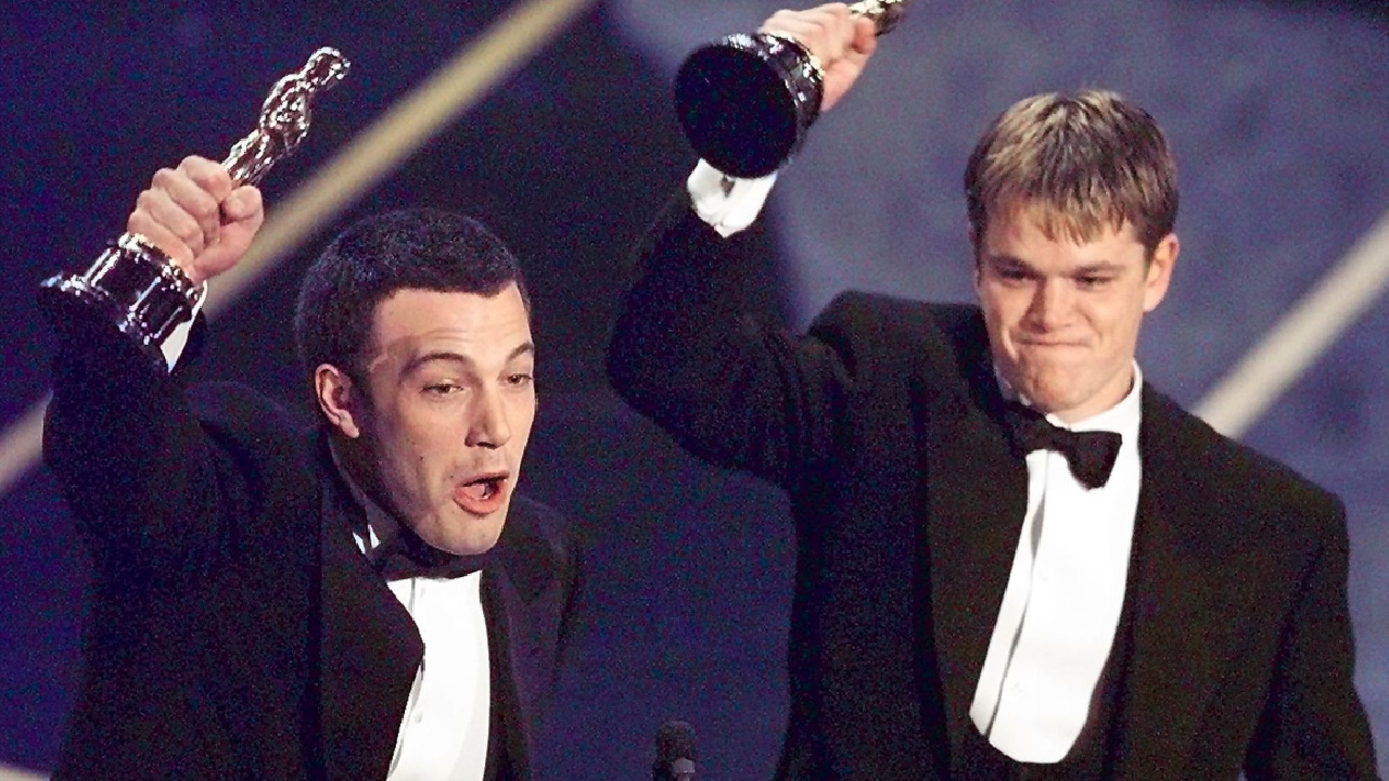 Ben Affleck and Matt Damon win Best Original Screenplay for 'Good Will Hunting' during the 70th Academy Awards at the Shrine Auditorium. Photo: Timothy A. Clary/AFP/Getty Images.
