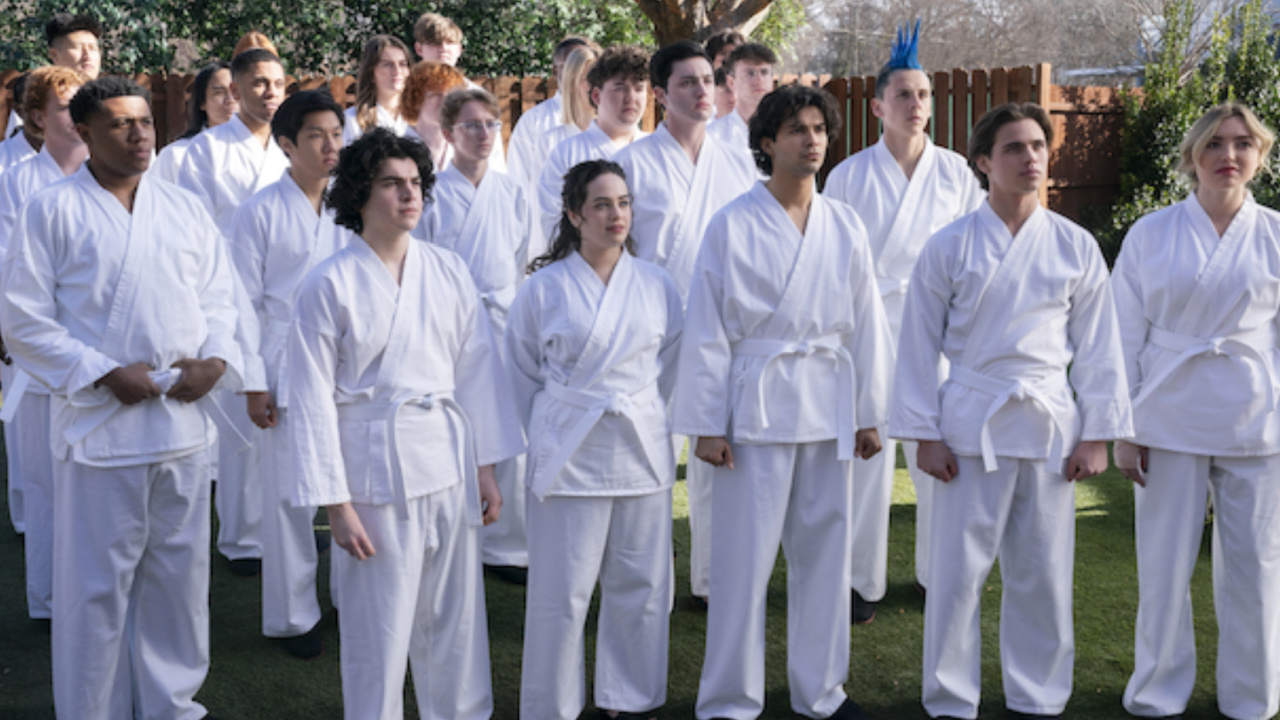 Khalil Everage as Chris, Nathaniel Oh as Nate, Griffin Santopeitro as Anthony Larusso, Owen Morgan as Bert, Mary Mouser as Samantha LaRusso, Aedin Mincks as Mitch, Gianni DeCenzo as Demetri, Xolo Maridueña as Miguel Diaz, Jacob Bertrand as Eli 'Hawk' Moskowitz, Tanner Buchanan as Robby Keene, Peyton List as Tory Nichols in 'Cobra Kai' season 6.