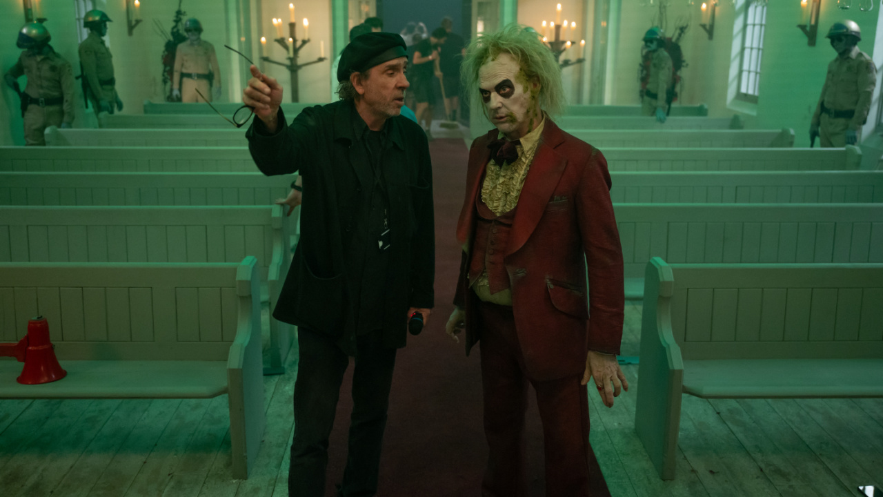 (L to R) Director Tim Burton and Michael Keaton on the set of Warner Bros. Pictures’ comedy, 'Beetlejuice Beetlejuice', a Warner Bros. Pictures release. Photo Credit: Parisa Taghizadeh. Copyright: © 2024 Warner Bros. Entertainment Inc. All Rights Reserved.