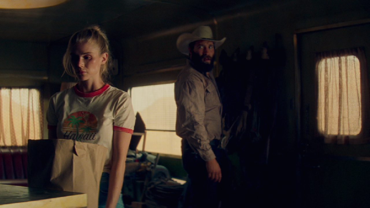 (L to R) Erin Moriarty and Jai Courtney in 'Catching Dust'. Photo: Vertical.