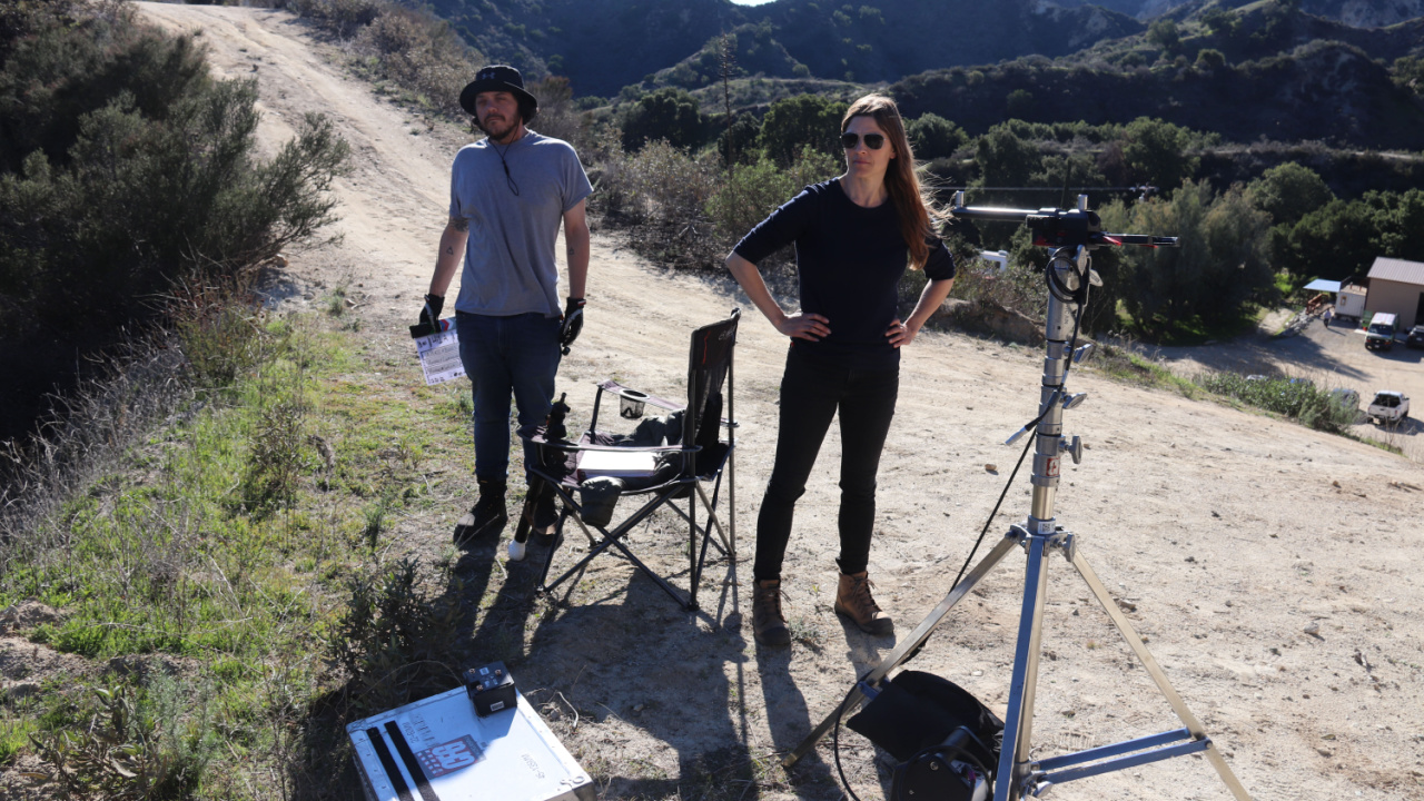 (Right) Director Audrey Cummings behind the scenes of the horror/thriller “Place of Bones,” a release from The Avenue. Photo courtesy of The Avenue.