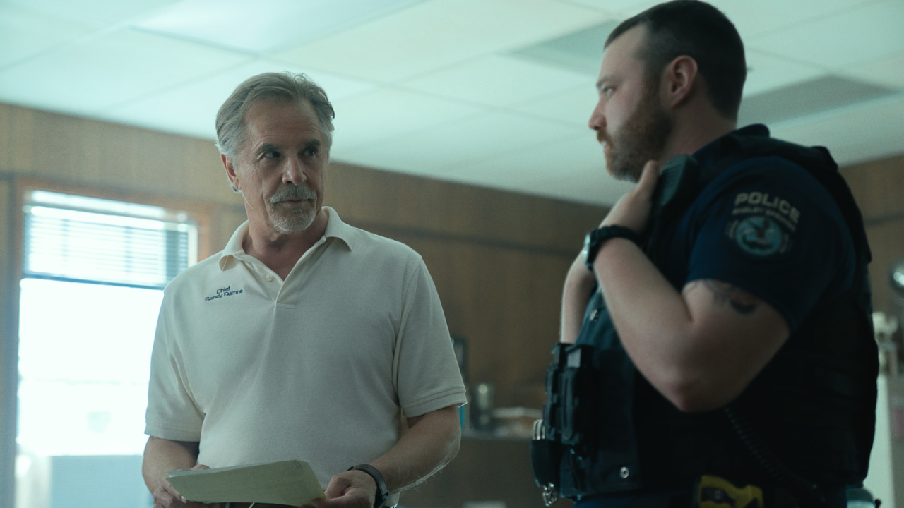 (L to R) Don Johnson as Chief Sandy Burnne and Emory Cohen as Officer Steve Lann in 'Rebel Ridge'. Photo: Allyson Riggs/Netflix © 2024.