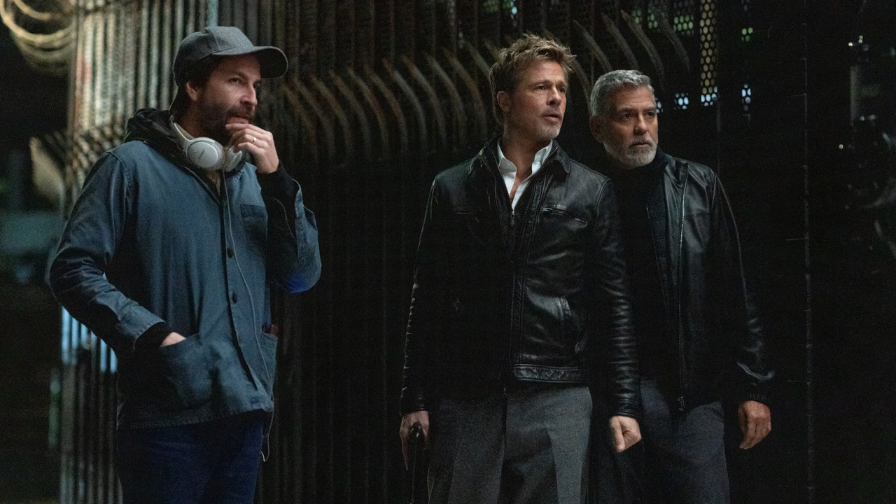 Director Jon Watts, Brad Pitt and George Clooney on the set of 'Wolfs'.