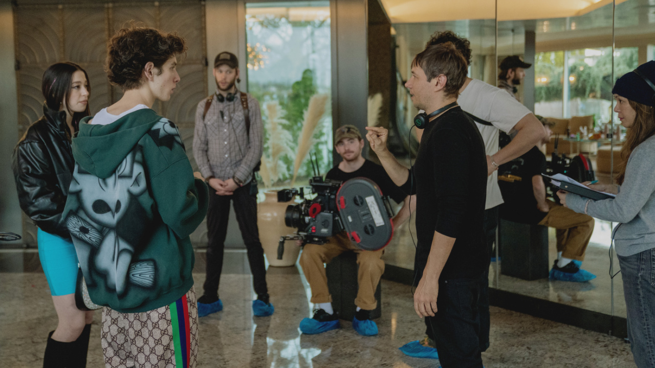 (L to R) Sean Baker, Mikey Madison, and Mark Eydelshteyn on the set of 'Anora'. Photo: Courtesy of NEON.