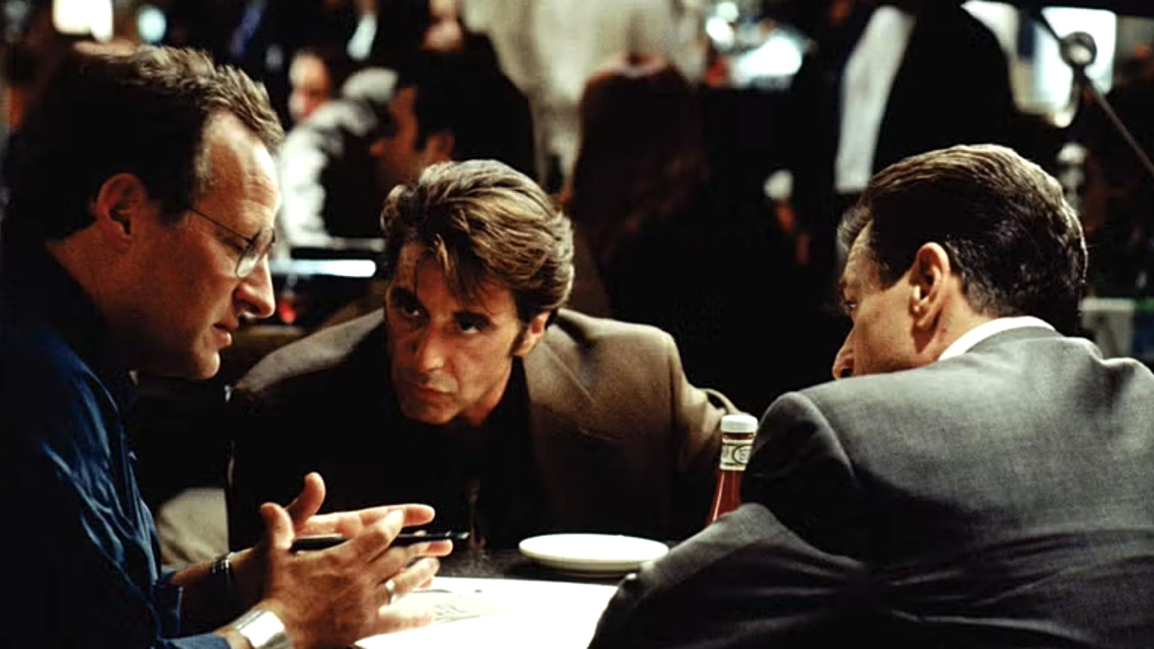 (L to R) Director Michael Mann, Al Pacino and Robert De Niro on the set of 1995's 'Heat'. Photo: Warner Bros.