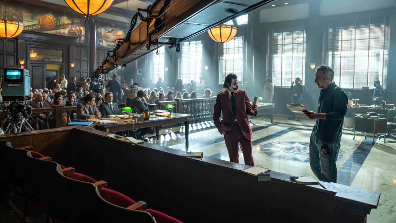 (L to R) Joaquin Phoenix and director Todd Phillips on the set of Warner Bros. Pictures’ 'Joker: Folie à Deux,' a Warner Bros. Pictures release. Photo Credit: Niko Tavernise/™ & © DC Comics. Copyright: © 2024 Warner Bros. Ent. All Rights Reserved. TM & © DC.