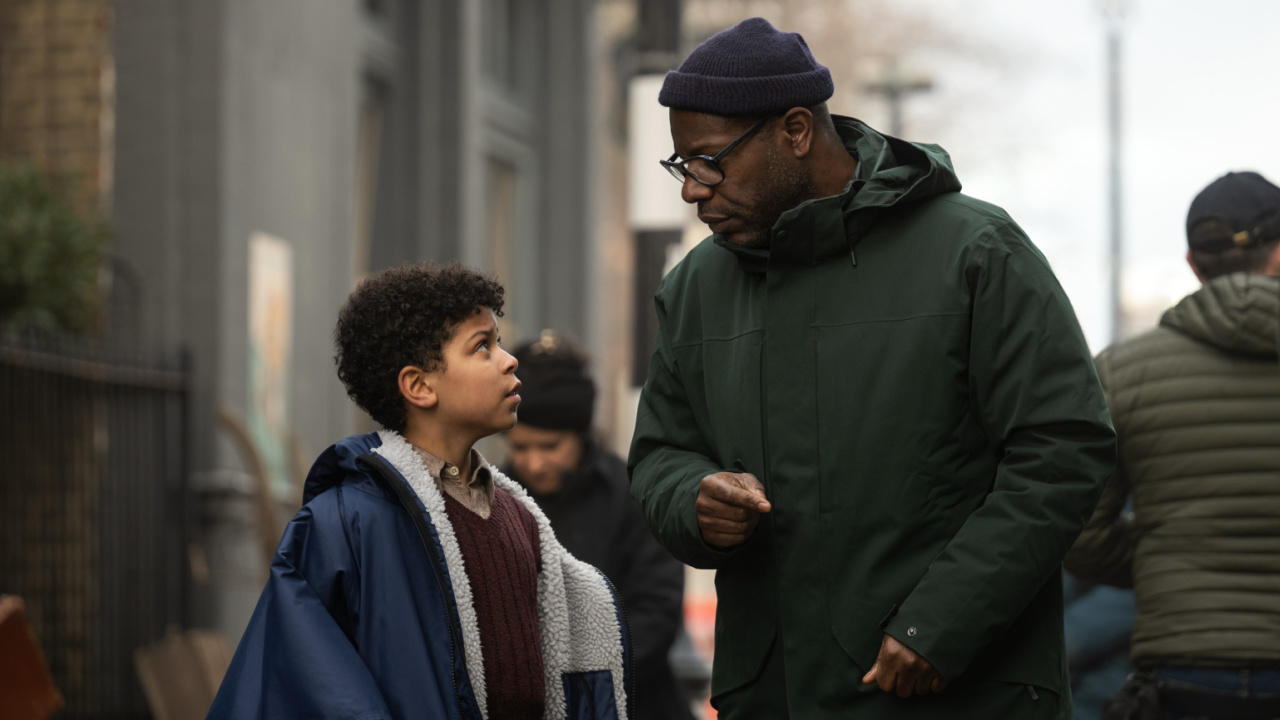 (L to R) Elliott Heffernan and Steve McQueen on the set of 'Blitz,' now in theaters and premiering globally on Apple TV+ on November 22.