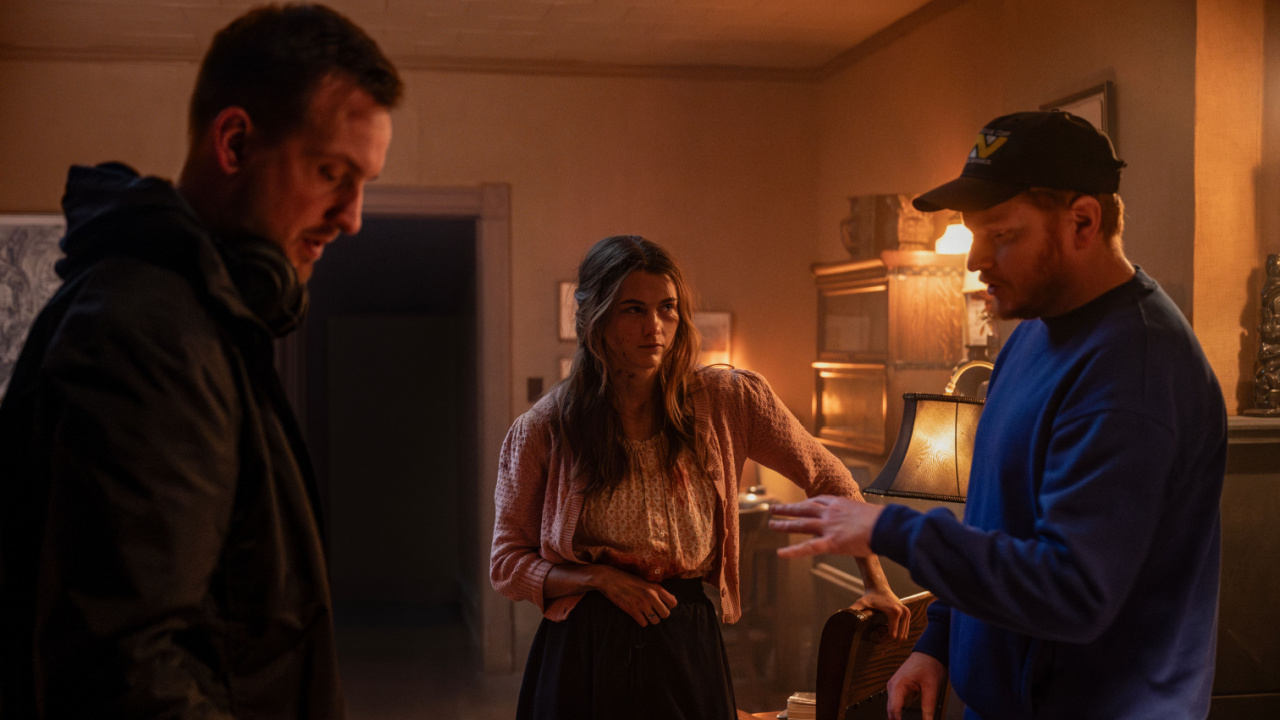 (L to R) Co-director Bryan Woods, Chloe East, and co-director Scott Beck on the set of 'Heretic'. Photo: A24.