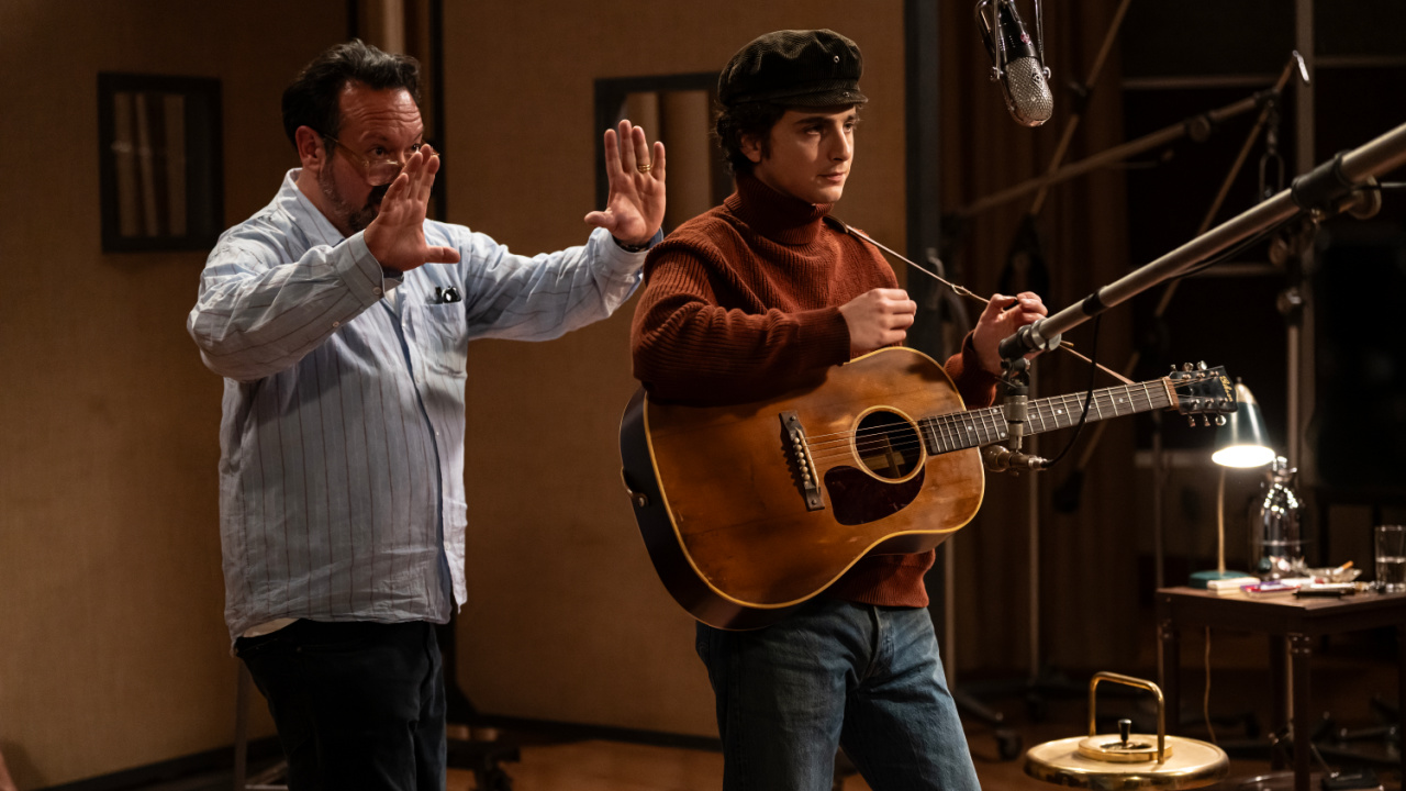 (L to R) Director James Mangold and Timothée Chalamet on the set of 'A Complete Unkown'. Photo by Macall Polay, Courtesy of Searchlight Pictures. © 2024 Searchlight Pictures All Rights Reserved.