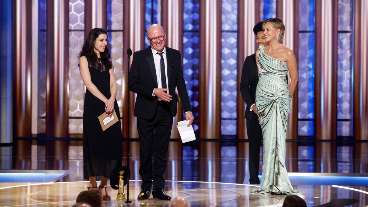 ( L to R) Interpretar Abla Kandalaft and Jacques Audiard accepts the award for Motion Picture - Non-English Language at the 82nd Annual Golden Globe Awards, airing live from the Beverly Hilton in Beverly Hills, California on Sunday, January 5, 2025, at 8 PM ET/5 PM PT, on CBS and streaming on Paramount+. Photo: Sonja Flemming/CBS ©2025 CBS Broadcasting, Inc. All Rights Reserved.