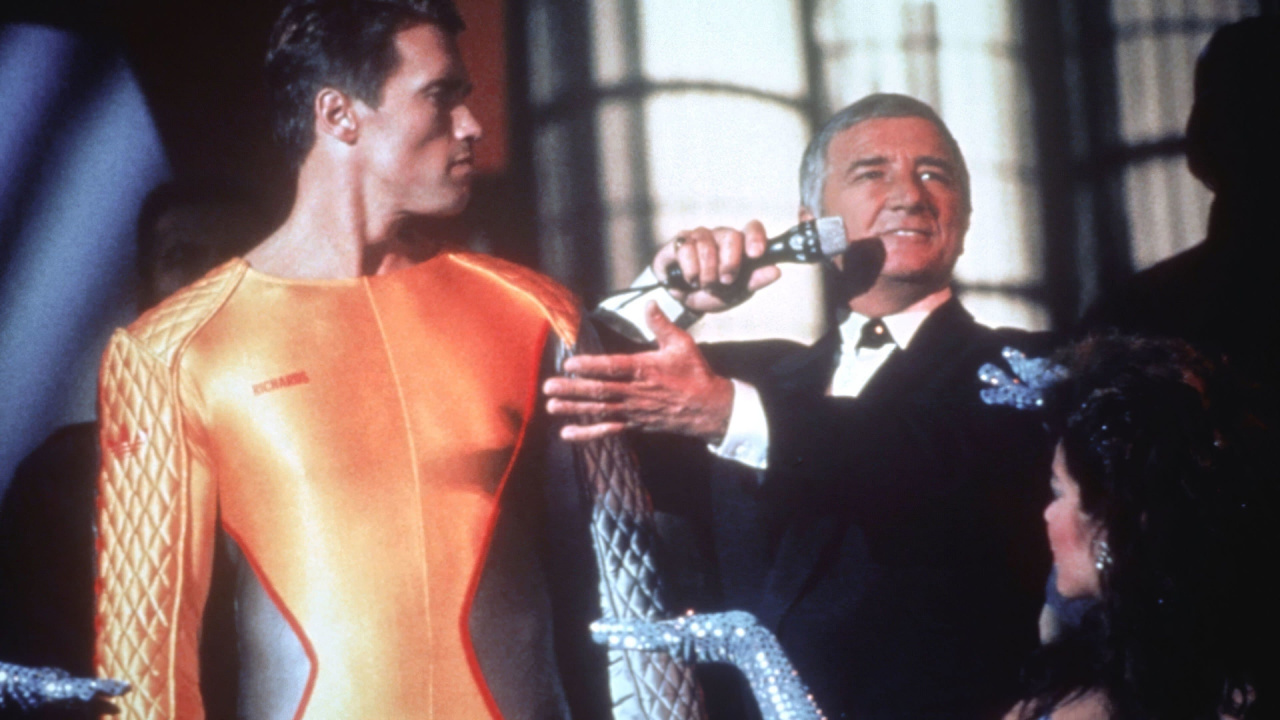 (L to R) Arnold Schwarzenegger and Richard Dawson in 'The Running Man.' Photo: Tri-Star Pictures.