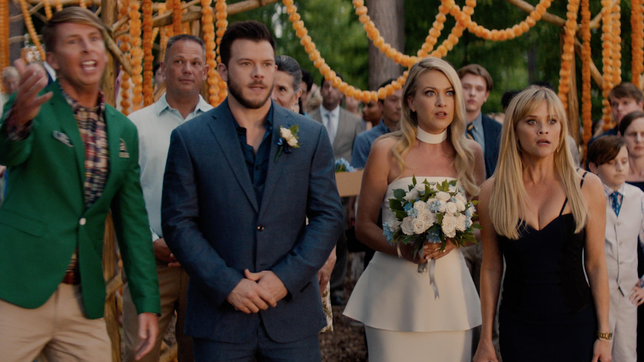 (L to R) Jack McBrayer, Jimmy Tatro, Meredith Hagner and Reese Witherspoon in 'You're Cordially Invited'. Photo Credit: Glen Wilson/Prime Video. Copyright: © 2023 Amazon Content Services LLC.