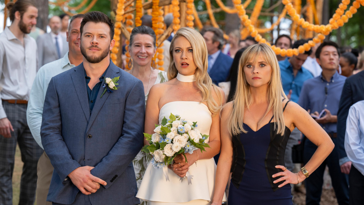 (L to R) Jimmy Tatro, Meredith Hagner and Reese Witherspoon in 'You're Cordially Invited'. Photo Credit: Glen Wilson/Prime Video. Copyright: © 2023 Amazon Content Services LLC.