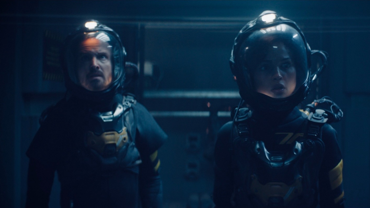 (L to R) Aaron Paul and Eiza González in Flying Lotus’s 'Ash'. Courtesy of RLJE Films & Shudder. An RLJE Films & Shudder Release.