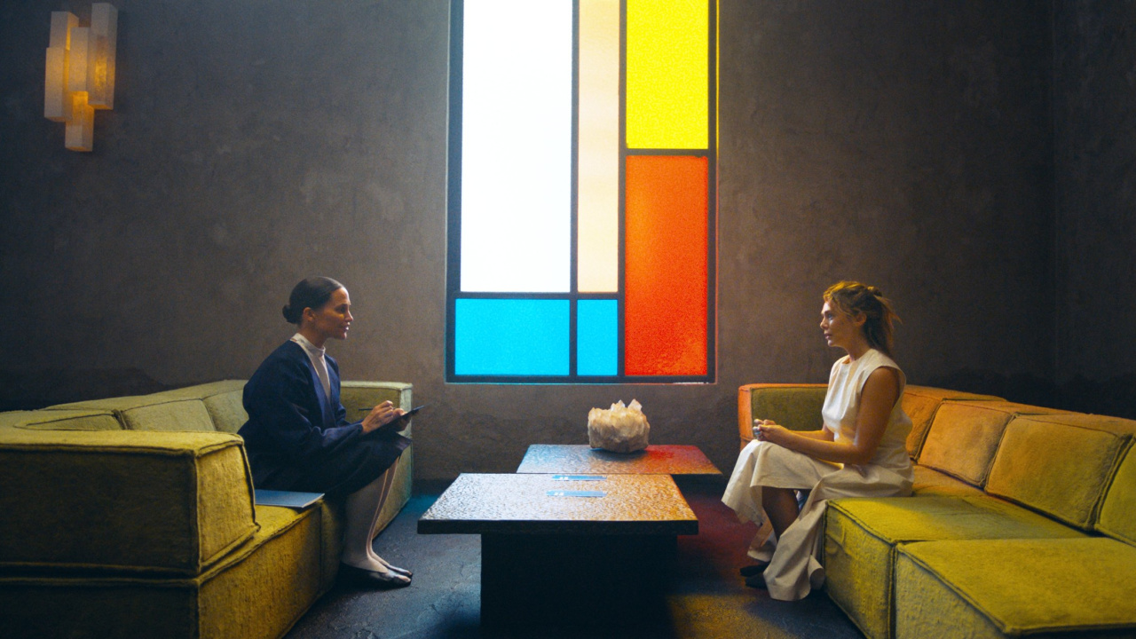 (L to R) Alicia Vikander and Elizabeth Olsen in 'The Assessment', a Magnolia Pictures release. Photo credit: Magnus Jønck. © 2024 Number 9 Films Assessment Limited, TA Co-Production GmbH, ShivHans Productions, LLC, TA2022 Investors, LLC, Tiki Tāne Pictures, LLC. Photo courtesy of Magnolia Pictures.