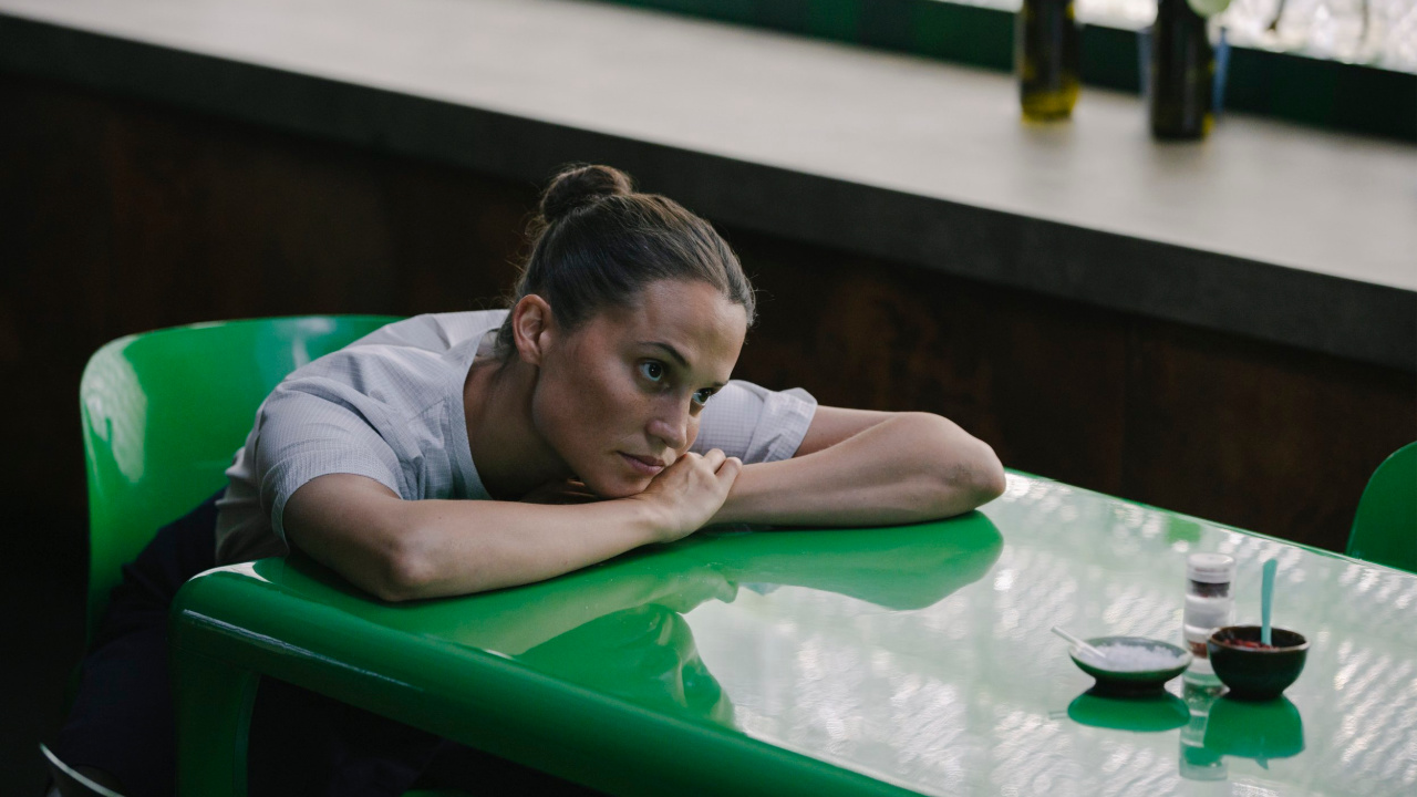 Alicia Vikander in 'The Assessment', a Magnolia Pictures release. Photo credit: Magnus Jønck. © 2024 Number 9 Films Assessment Limited, TA Co-Production GmbH, ShivHans Productions, LLC, TA2022 Investors, LLC, Tiki Tāne Pictures, LLC. Photo courtesy of Magnolia Pictures.