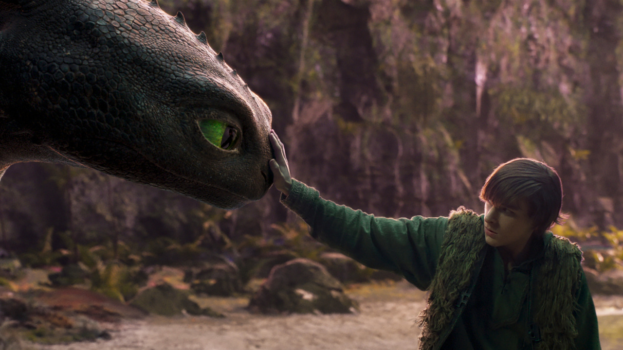 Mason Thames (right) as Hiccup with his Night Fury dragon, Toothless, in Universal Pictures’ live-action 'How to Train Your Dragon,' written and directed by Dean DeBlois. Photo: Universal Pictures.