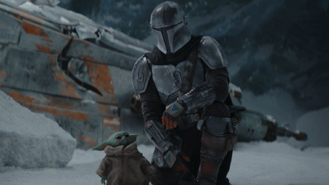 The Mandalorian (Pedro Pascal) and the Child in 'The Mandalorian,' season two. © 2020 Lucasfilm Ltd. & TM. All Rights Reserved.