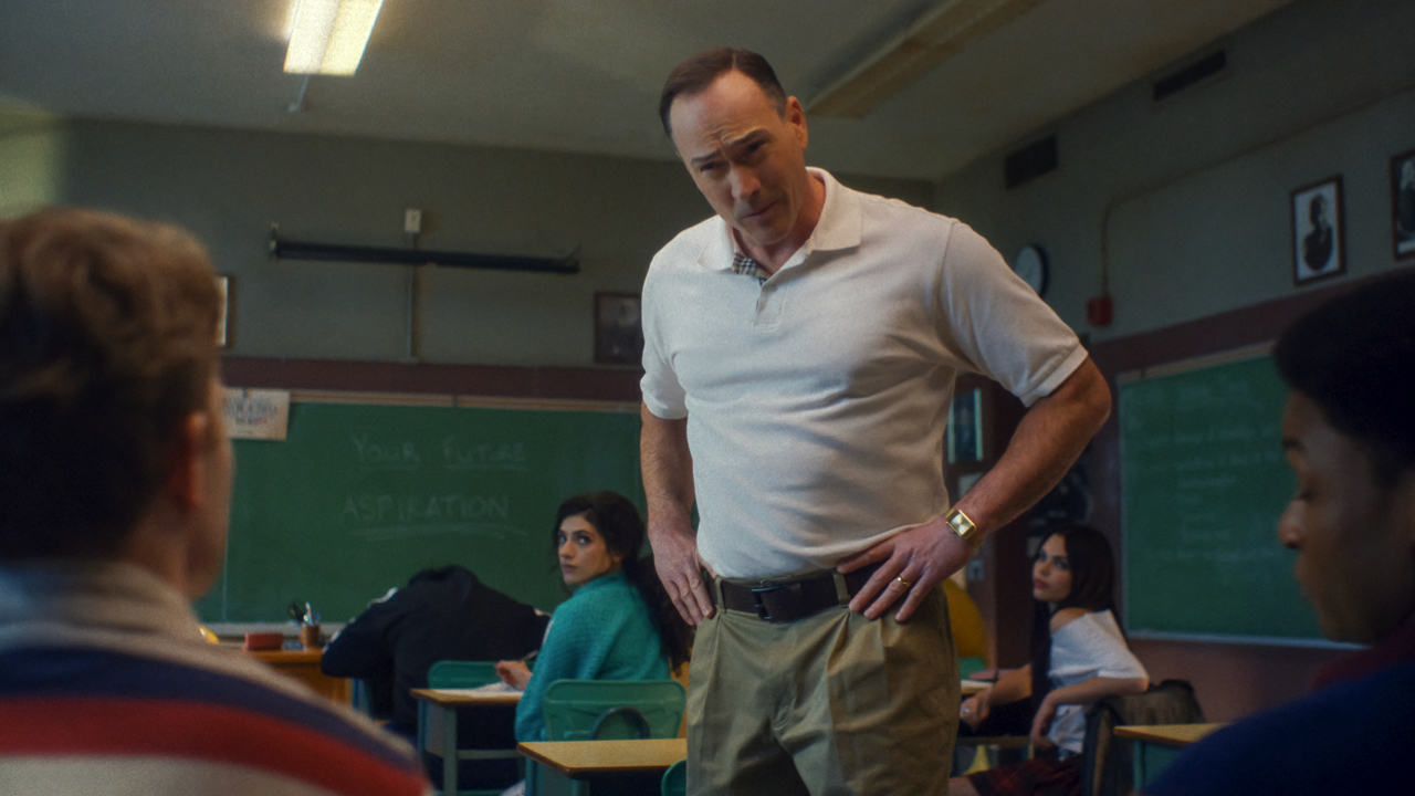 (L-R) Ella Rubin as Melissa, Chris Klein as Dan Falconer, Ariana Greenblatt as Christy Renault and Ryan Rosery as Chad in 'Fear Street: Prom Queen.' Photo: Netflix © 2025.
