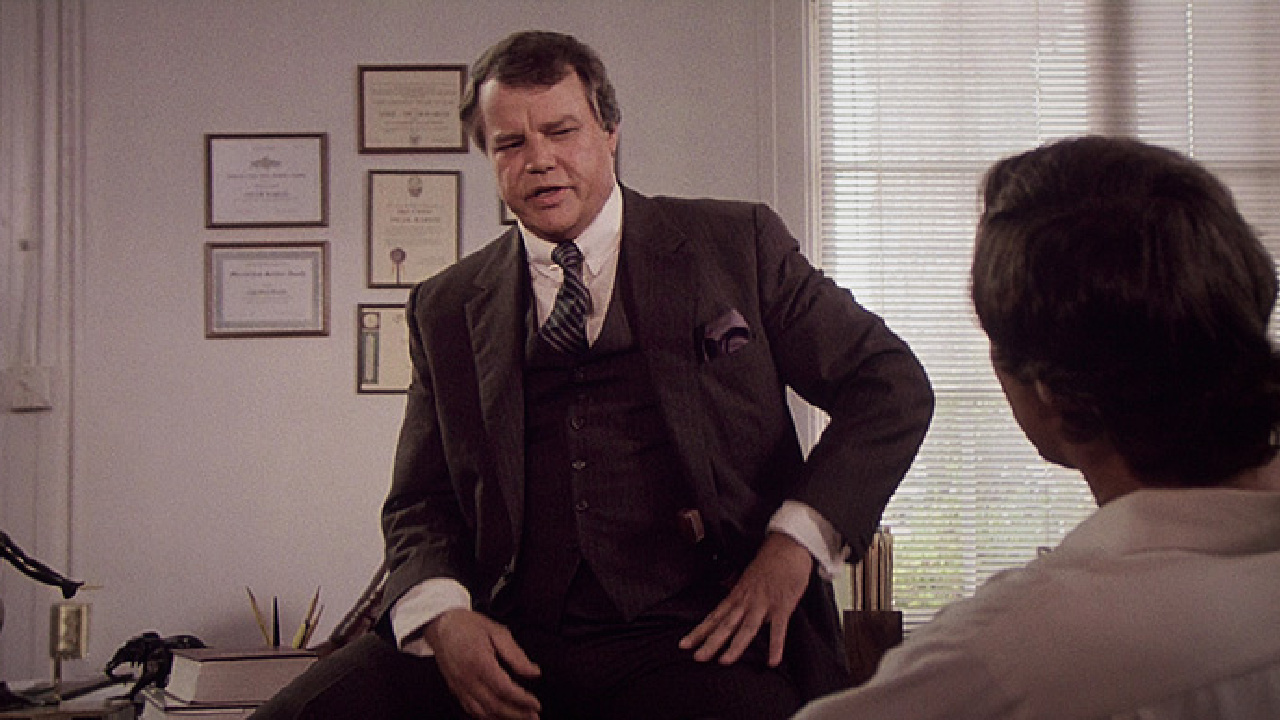 (L to R) Joe Don Baker and Chevy Chase in 'Fletch'. Photo: Universal Pictures.