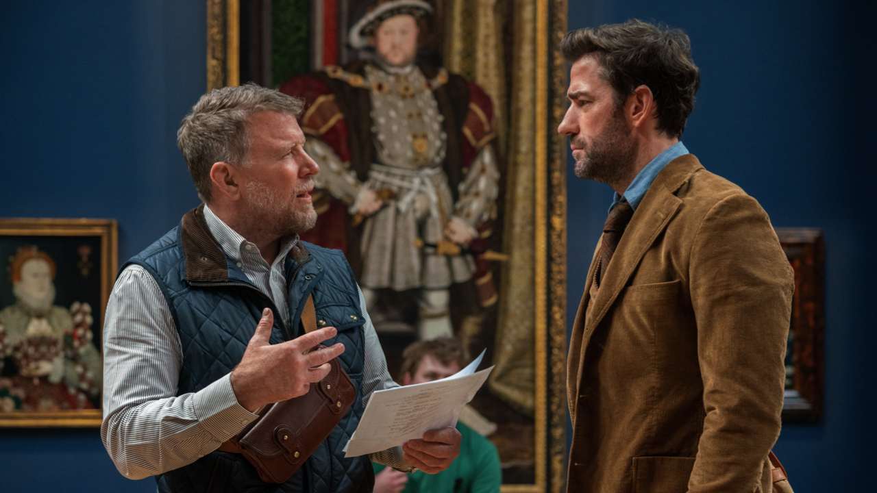 (L to R) Director Guy Ritchie and star John Krasinski behind-the-scenes of 'Fountain of Youth,' premiering May 23, 2025 on Apple TV+.