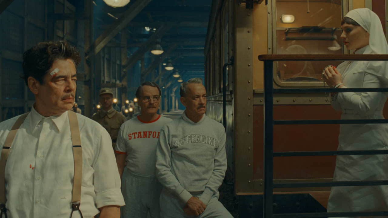 (L to R) Benicio Del Toro as Zsa-Zsa Korda, Bryan Cranston as Reagan, Tom Hanks as Leland, and Mia Threapleton as Liesl in director Wes Anderson's 'The Phoenician Scheme', a Focus Features release. Credit: Courtesy of TPS Productions/Focus Features © 2025 All Rights Reserved.