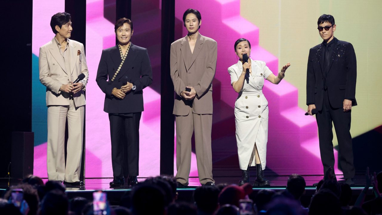 (L to R) Lee Jung-jae, Lee Byung-hun, Park Sung-hoon, Kang Ae-shim, and Choi Seung-hyun speak onstage during Netflix TUDUM 2025: The Live Event at The Kia Forum on May 31, 2025 in Inglewood, California. Photo by Kevin Mazur/Getty Images for Netflix.