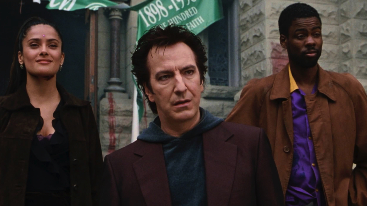 (Lto R) Salma Hayek Pinault, Alan Rickman and Chris Rock in 'Dogma.' Photo: Triple Media Film.