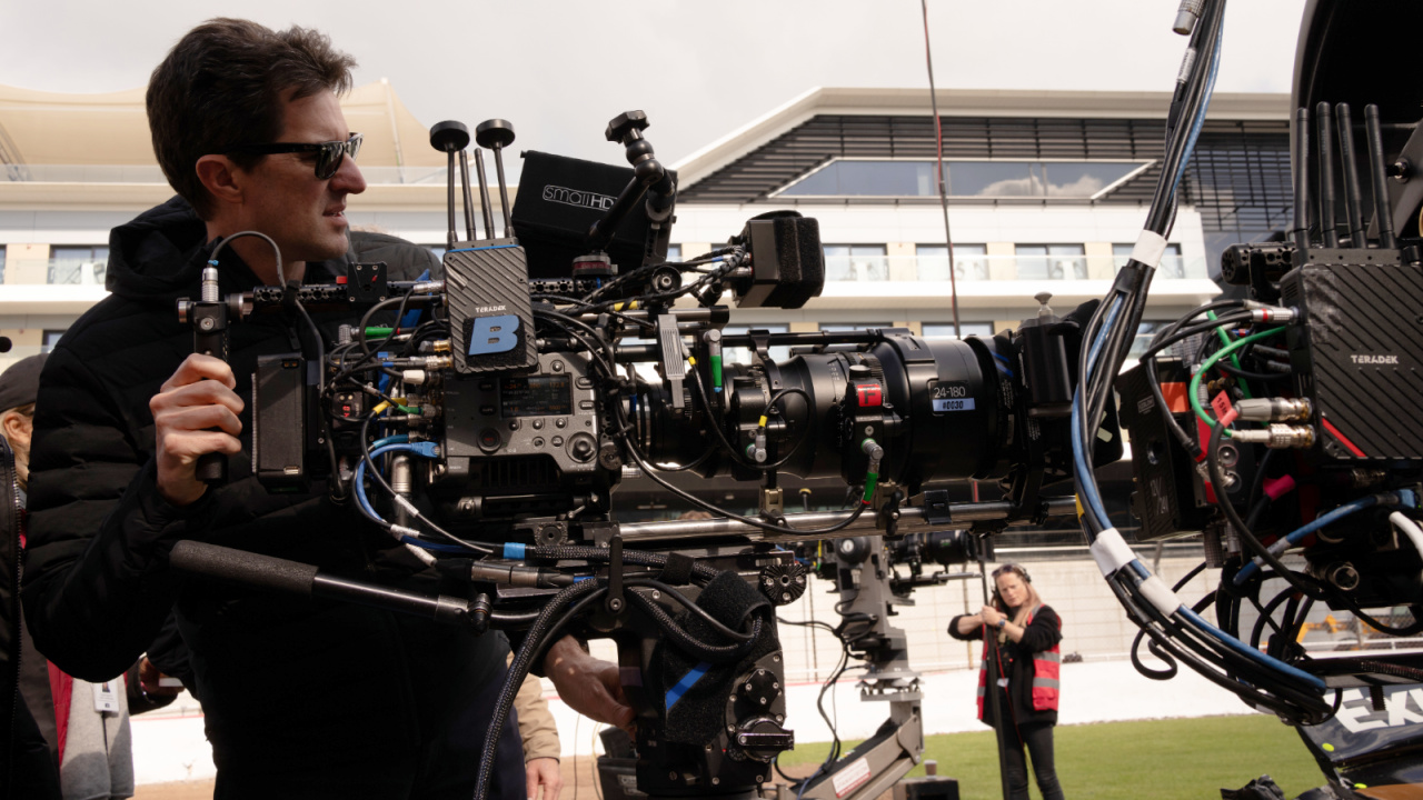 Director/Producer Joseph Kosinski on the set of Apple Original Films’ 'F1', a Warner Bros. Pictures release. Photo Credit: Photo by Scott Garfield. Courtesy Warner Bros Pictures / Apple Original Films. Copyright: © 2025 Warner Bros. Entertainment Inc. All Rights Reserved.