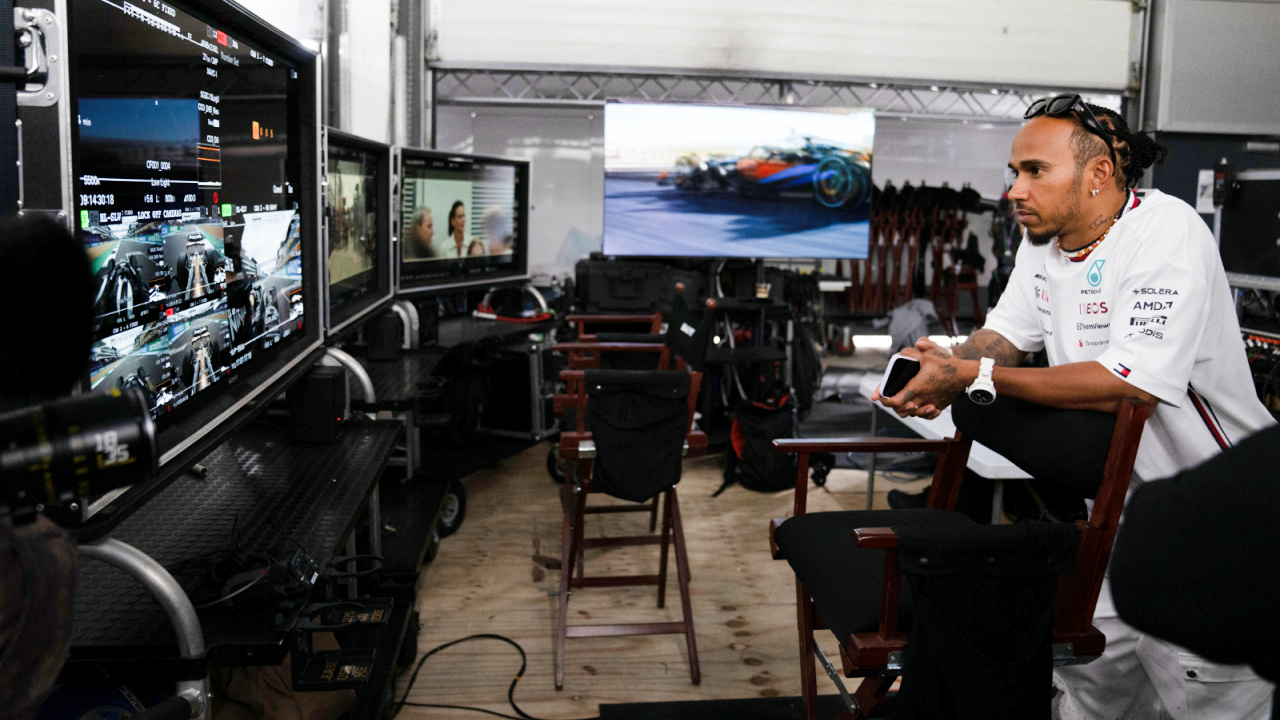 Producer Lewis Hamilton on the set of Apple Original Films’ 'F1', a Warner Bros. Pictures release. Photo Credit: Photo by Scott Garfield. Courtesy Warner Bros Pictures / Apple Original Films. Copyright: © 2025 Warner Bros. Entertainment Inc. All Rights Reserved.