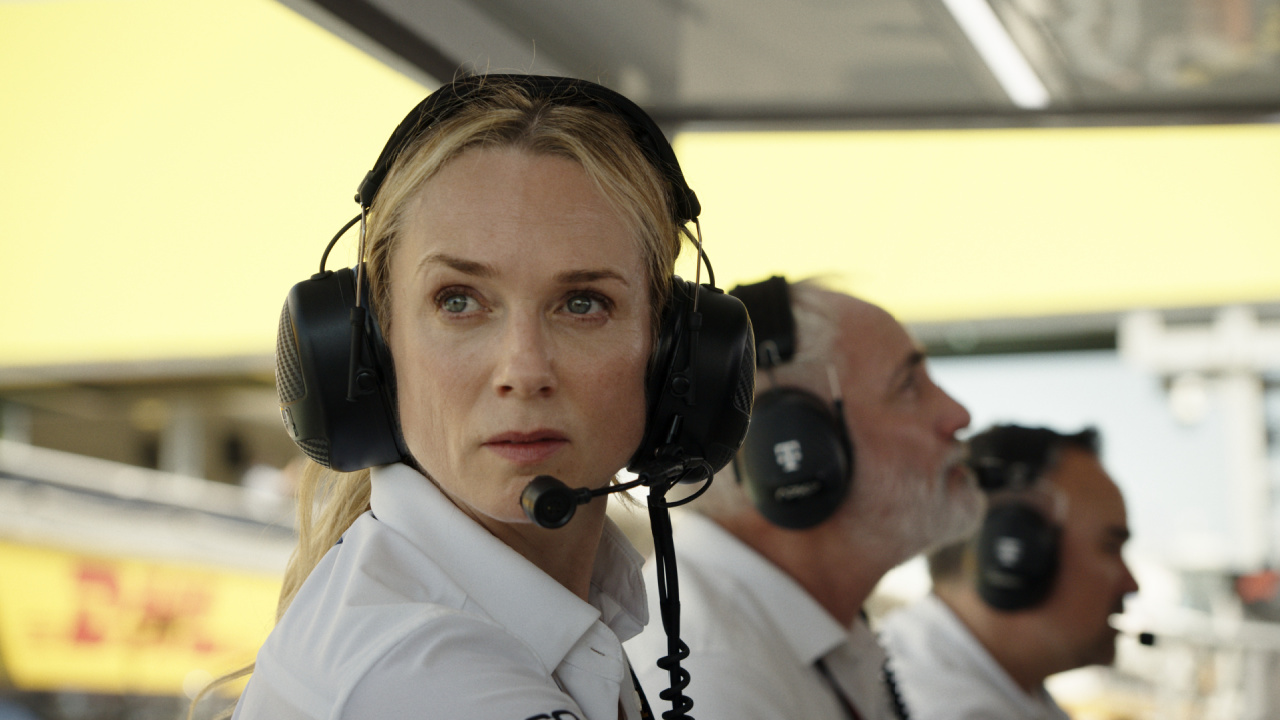 (L to R) Kerry Condon as Kate and Kim Bonia as Kaspar in Apple Original Films’ 'F1' a Warner Bros. Pictures release. Photo Credit: Photo Courtesy Warner Bros. Pictures / Apple Original Films. Copyright: © 2025 Warner Bros. Entertainment Inc. All Rights Reserved.