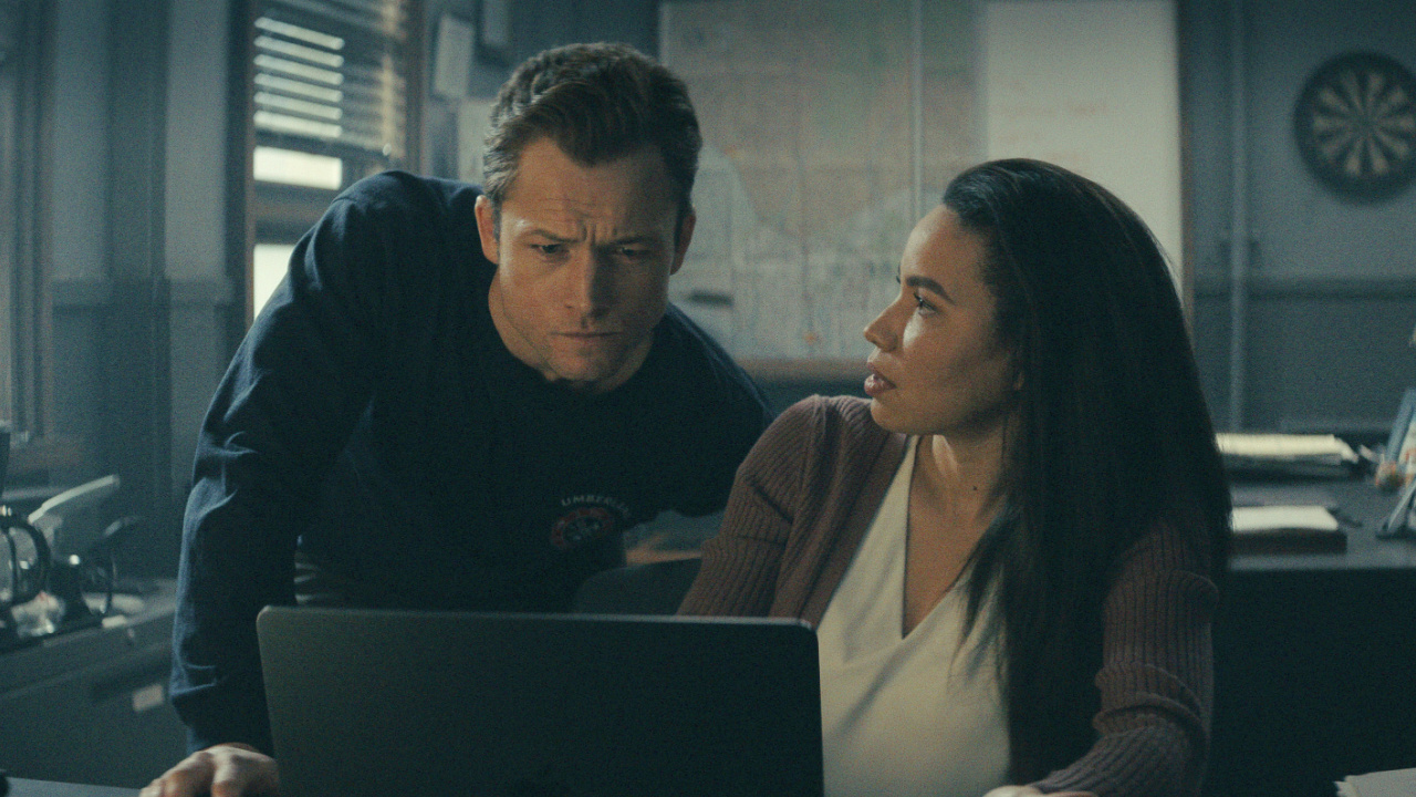 (L to R) Taron Egerton and Jurnee Smollett in 'Smoke,' premiering June 27, 2025 on Apple TV+.