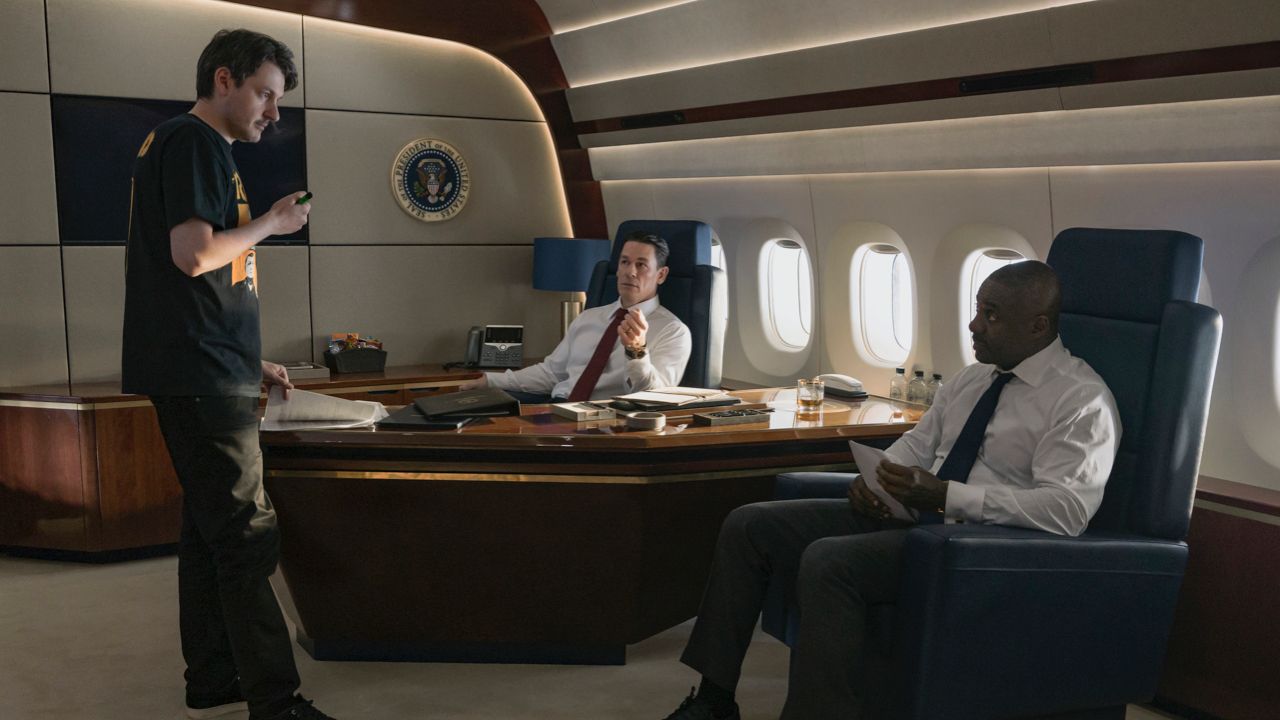 (L to R): Ilya Naishuller, John Cena and Idris Elba on the set of ‘Heads of State’. Photo: Chiabella James/Prime. © 2023 Amazon Content Services LLC.