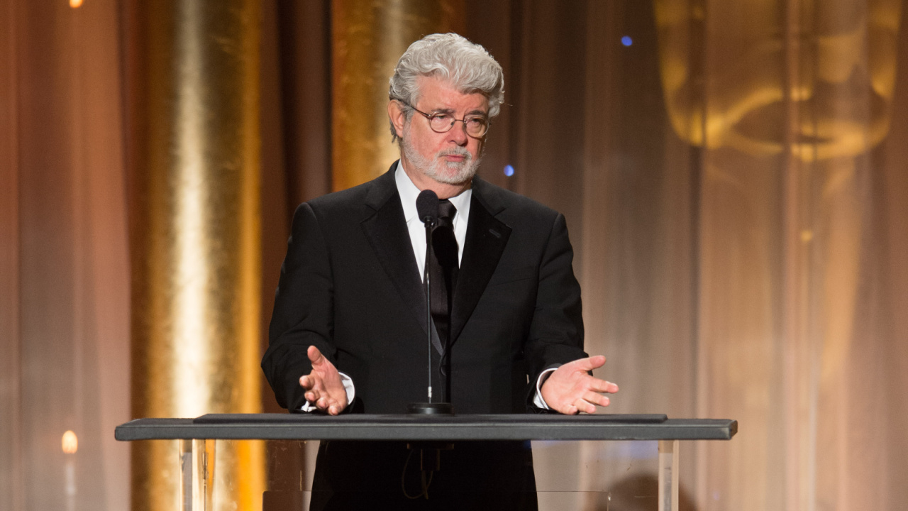 Oscar®-nominated writer/director/producer George Lucas speaks as part of the award presentation to Jean Hersholt Humanitarian Award recipient Angelina Jolie during the 2013 Governors Awards at The Ray Dolby Ballroom at Hollywood & Highland Center® in Hollywood, CA, on Saturday, November 16, 2013. Credit/Provider: Todd Wawrychuk / ©A.M.P.A.S. Copyright: ©A.M.P.A.S.