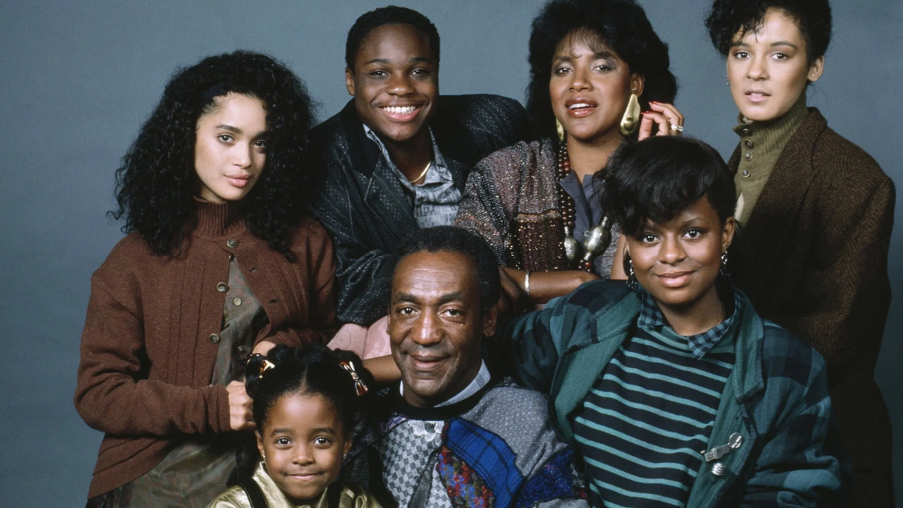 (L to R) Lisa Bonet, Malcolm-Jamal Warner, Phylicia Rashad, Sabrina Le Beauf, Keshia Knight Pulliam, Bill Cosby, and Tempestt Bledsoe, in 'The Cosby Show'. Photo: NBC Television.