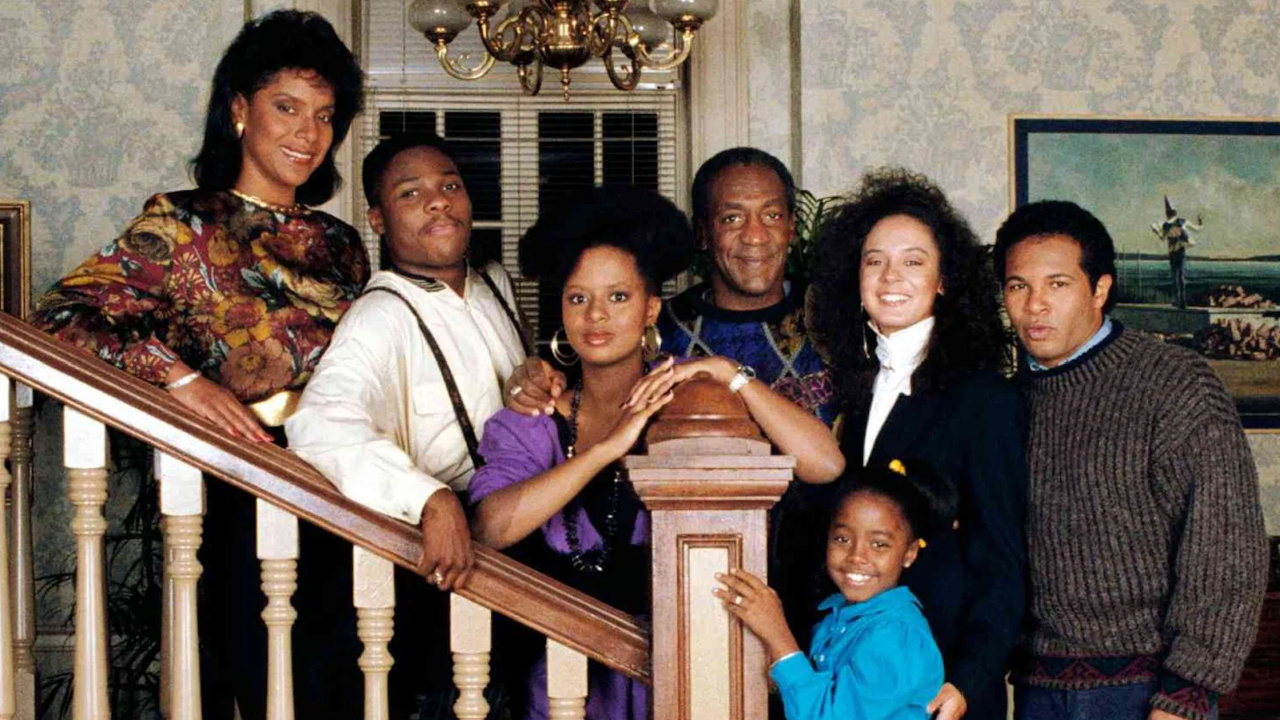 (L to R) Phylicia Rashad, Malcolm-Jamal Warner, Tempestt Bledsoe, Bill Cosby, Sabrina Le Beauf, Geoffrey Owens, and Keshia Knight Pulliam in 'The Cosby Show'. Photo: NBC Television.
