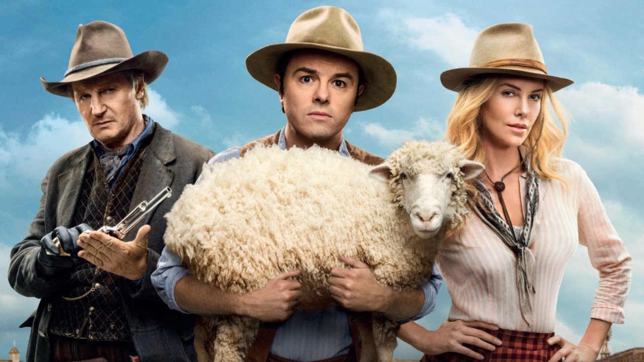 (L to R) Liam Neeson, Seth MacFarlane and Charlize Theron in 'A Million Ways to Die in the West'. Photo: Universal Pictures.