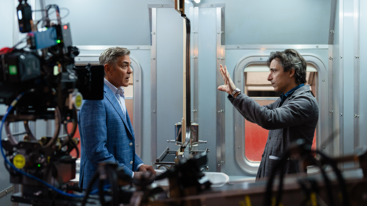 (L to R) George Clooney as Jay Kelly and director Noah Baumbach on the set of 'Jay Kelly'. Cr. Peter Mountain/Netflix © 2025.