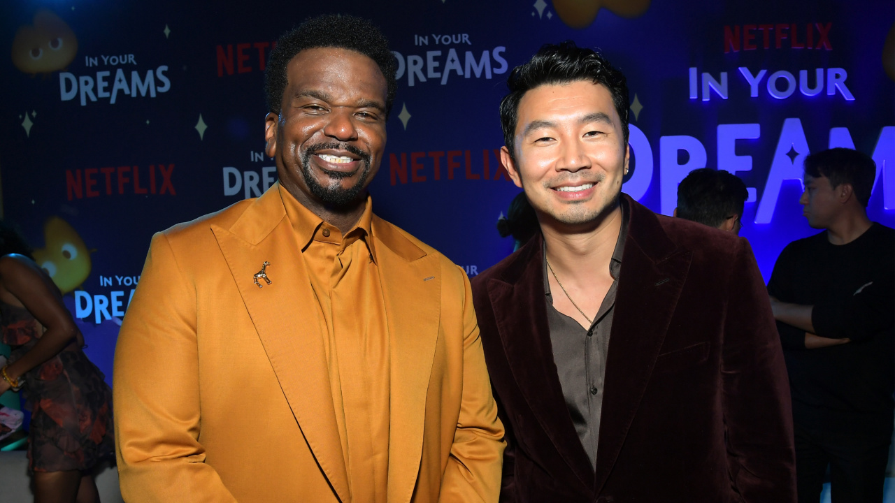 (L to R) Craig Robinson and Simu Liu attend Netflix's 'In Your Dreams' premiere on October 28, 2025 in Los Angeles, California. Photo by Charley Gallay/Getty Images for Netflix.