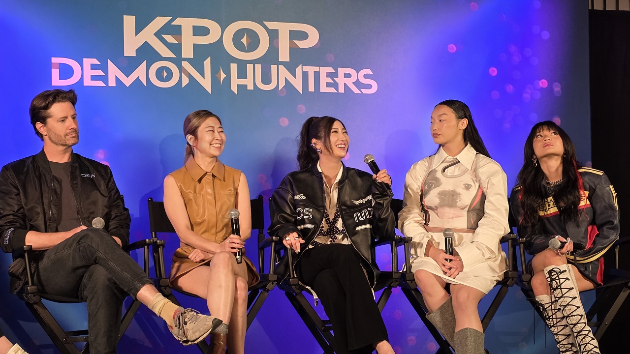 (L to R) Chris Appelhans (Director/Writer), Maggie Kang (Director/Writer), EJAE (Vocalist - Rumi / Songwriter, “Golden,” “How It’s Done,” “Your Idol” & “Hunter’s Mantra”), AUDREY NUNA (Vocalist - Mira), and REI AMI (Vocalist - Zoey) attend the press conference for Netflix's 'KPop Demon Hunters'.