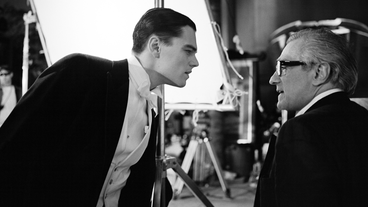 (L to R) Archival photo of Leonardo DiCaprio and Martin Scorsese on the set of "The Aviator" featured in 'Mr. Scorsese,' premiering October 17, 2025 on Apple TV+.