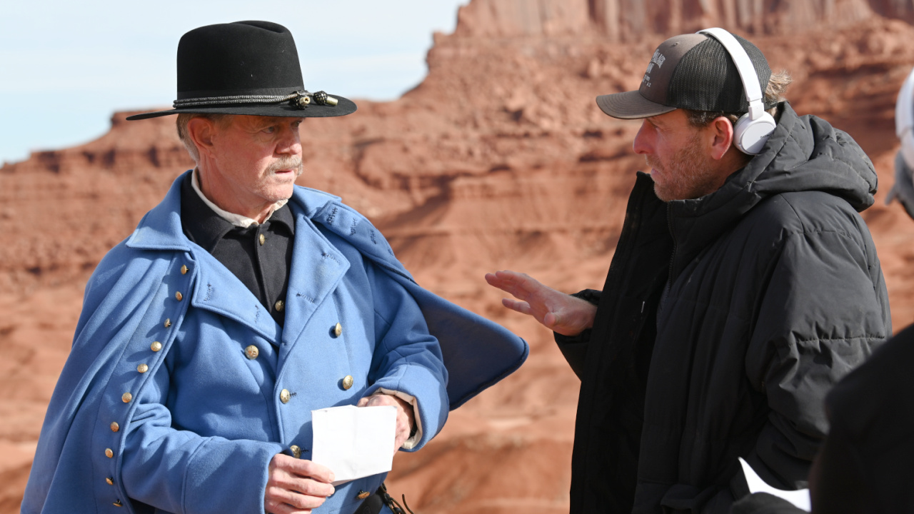 (L to R) William H. Macy as “Major O’Rourke” and Director Travis Mills behind the scenes on the western/thriller/drama film, 'Frontier Crucible', a Well Go USA film. Photo courtesy of Gene Page.