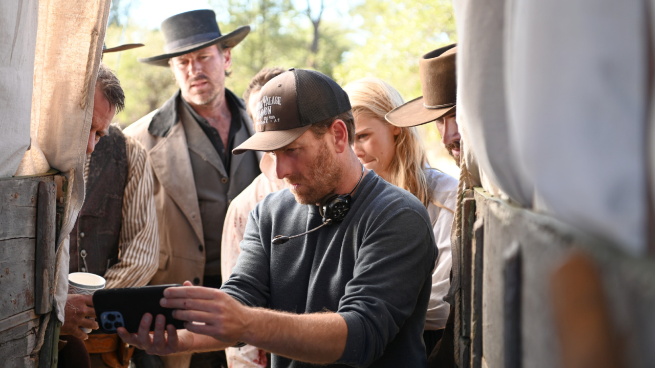 (Center Foreground) Director Travis Mills behind the scenes on the western/thriller/drama film, 'Frontier Crucible', a Well Go USA film. Photo courtesy of Gene Page.