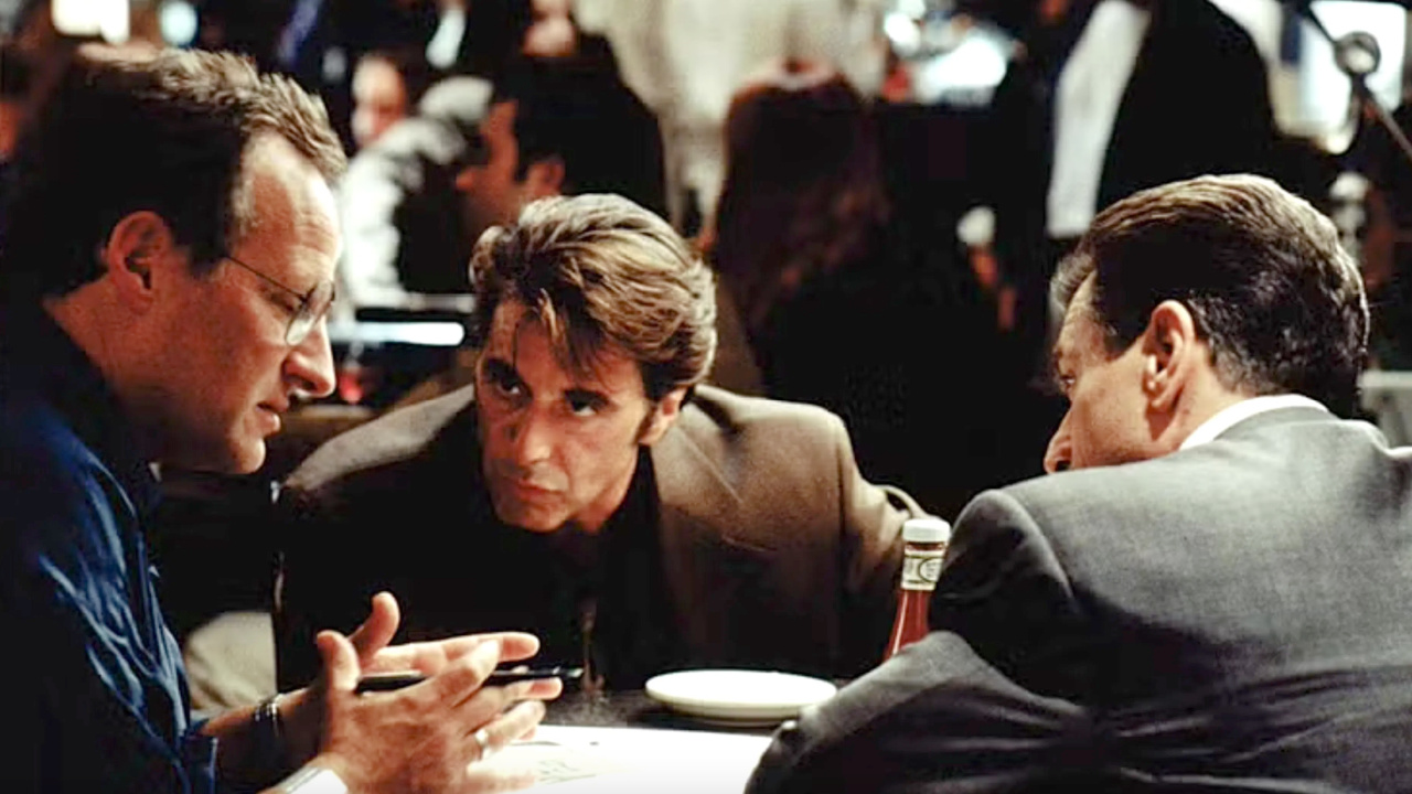 (L to R) Director Michael Mann, Al Pacino, and Robert De Niro on the set of 'Heat'. Photo: Warner Bros.