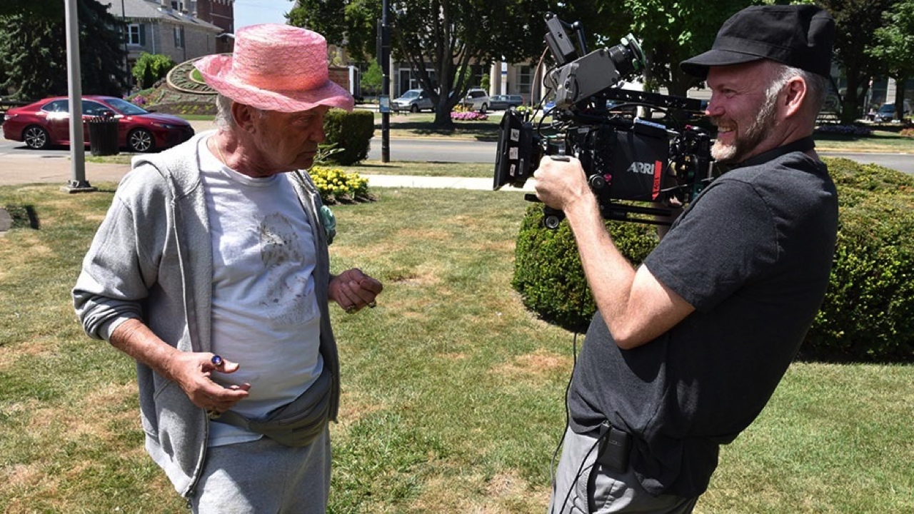 Udo Kier as Mr. Pat and director Todd Stephens on the set of 'Swan Song'