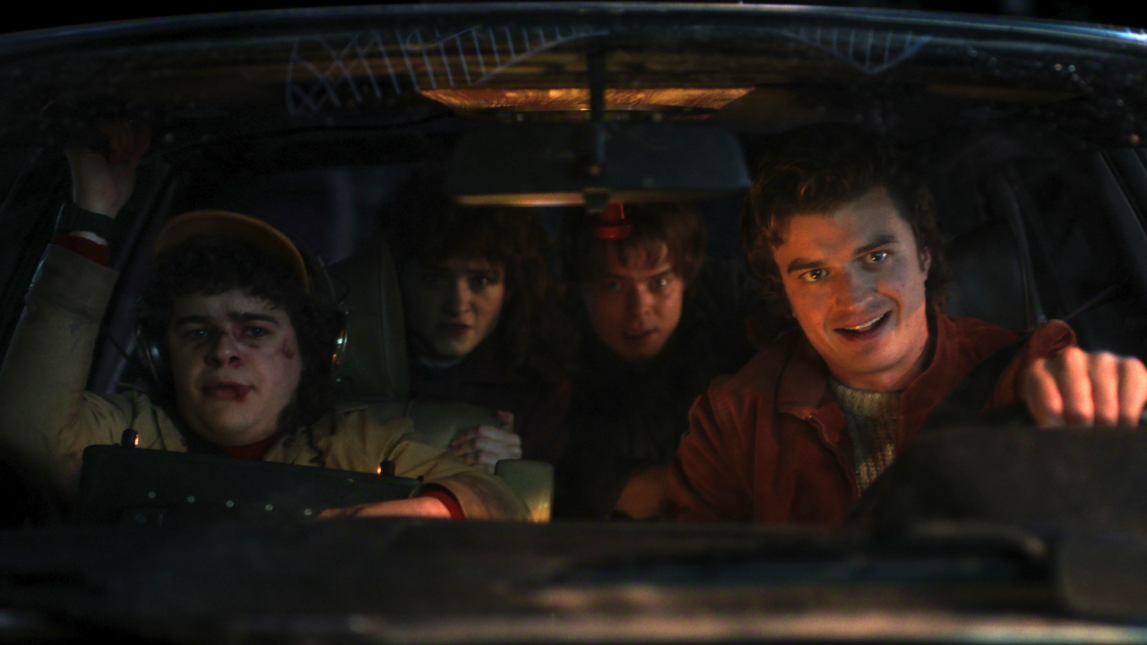 (L to R): Gaten Matarazzo as Dustin Henderson, Natalia Dyer as Nancy Wheeler, Charlie Heaton as Jonathan Byers, and Joe Keery as Steve Harrington in ‘Stranger Things: Season 5.’ Photo: COURTESY OF NETFLIX © 2025.